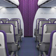 Illustration for article titled New Budget Airline Seats Swap Screens For Built-in Tablet Holders